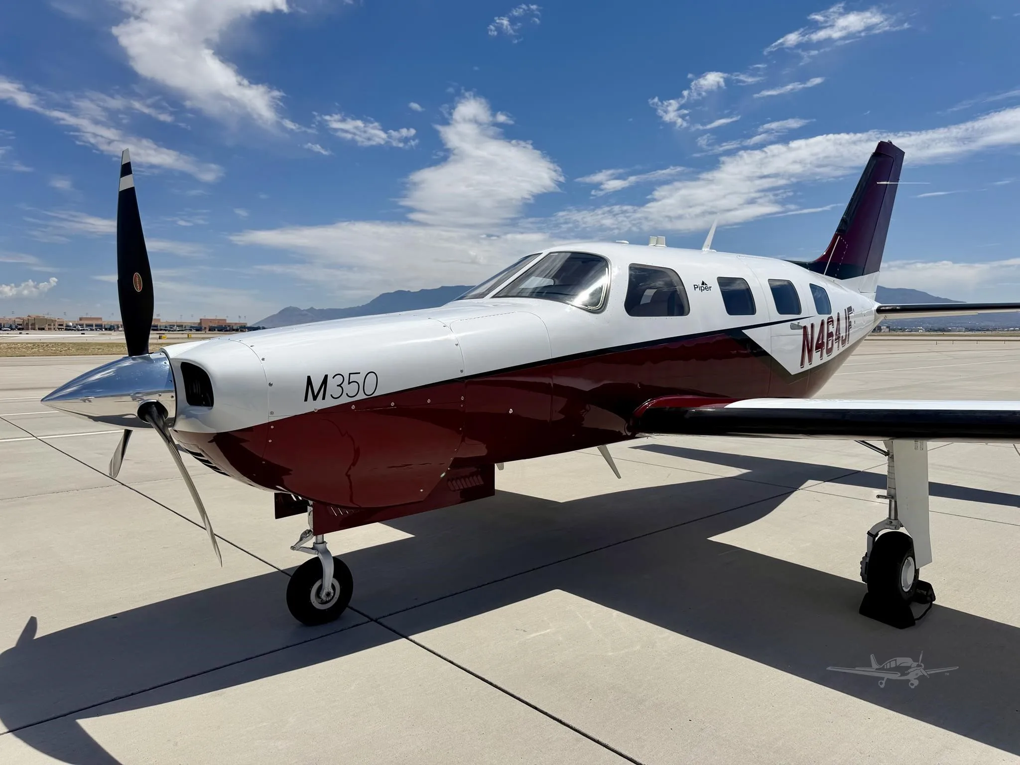 Exterior view of a 2019 PIPER M350, N464JF.