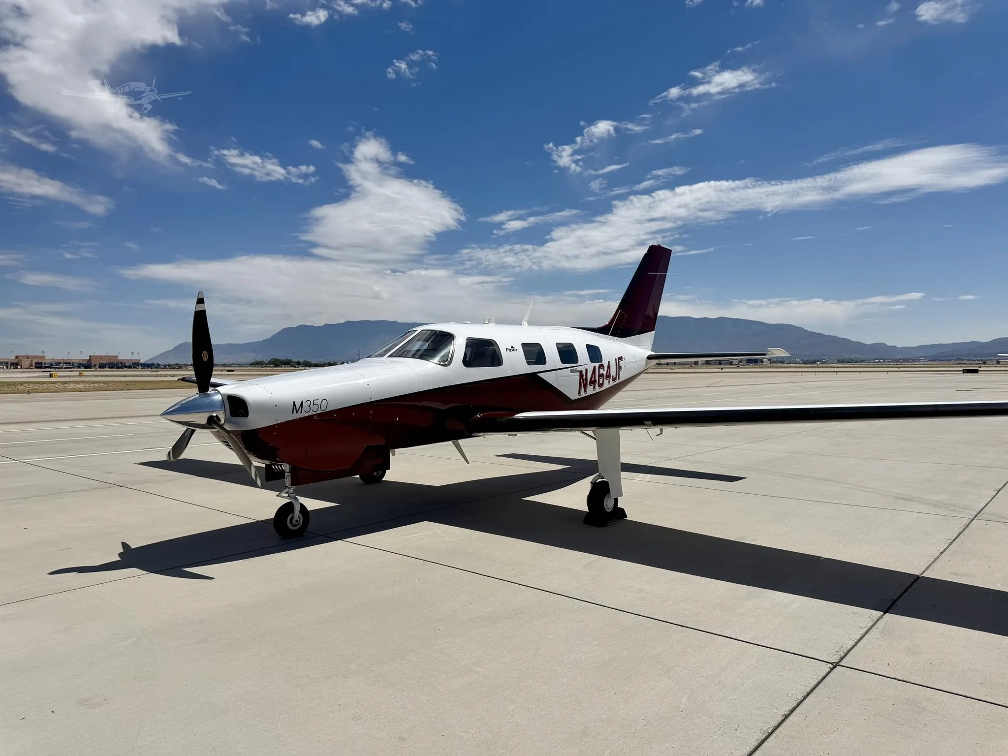 Exterior view of a 2019 PIPER M350, N464JF.