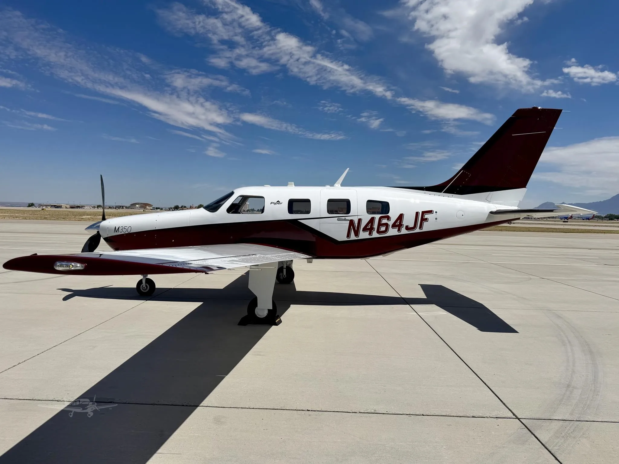 Exterior view of a 2019 PIPER M350, N464JF.