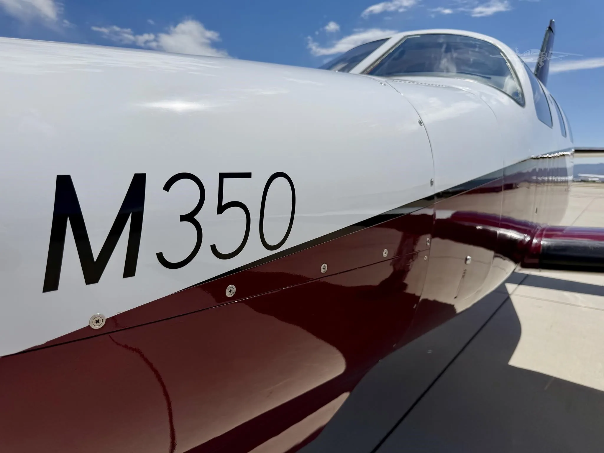 Exterior view of a 2019 PIPER M350, N464JF.