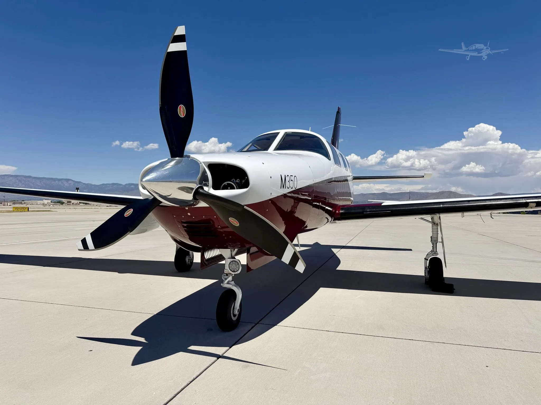 Exterior view of a 2019 PIPER M350, N464JF.