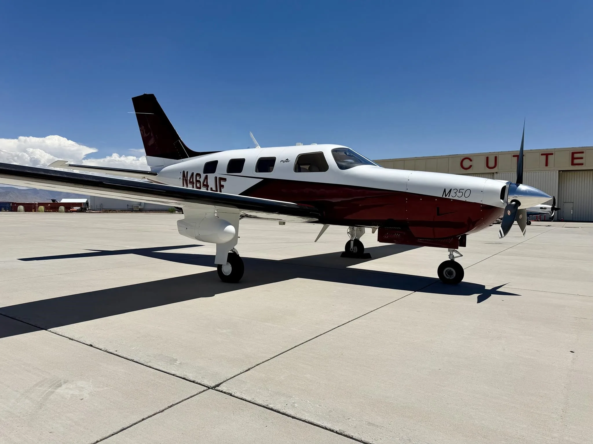 Exterior view of a 2019 PIPER M350, N464JF.