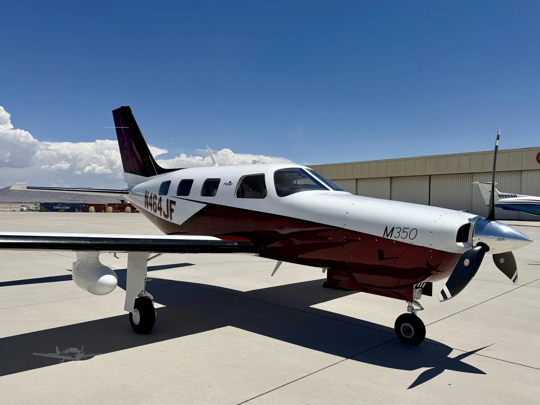 Exterior view of a 2019 PIPER M350, N464JF.