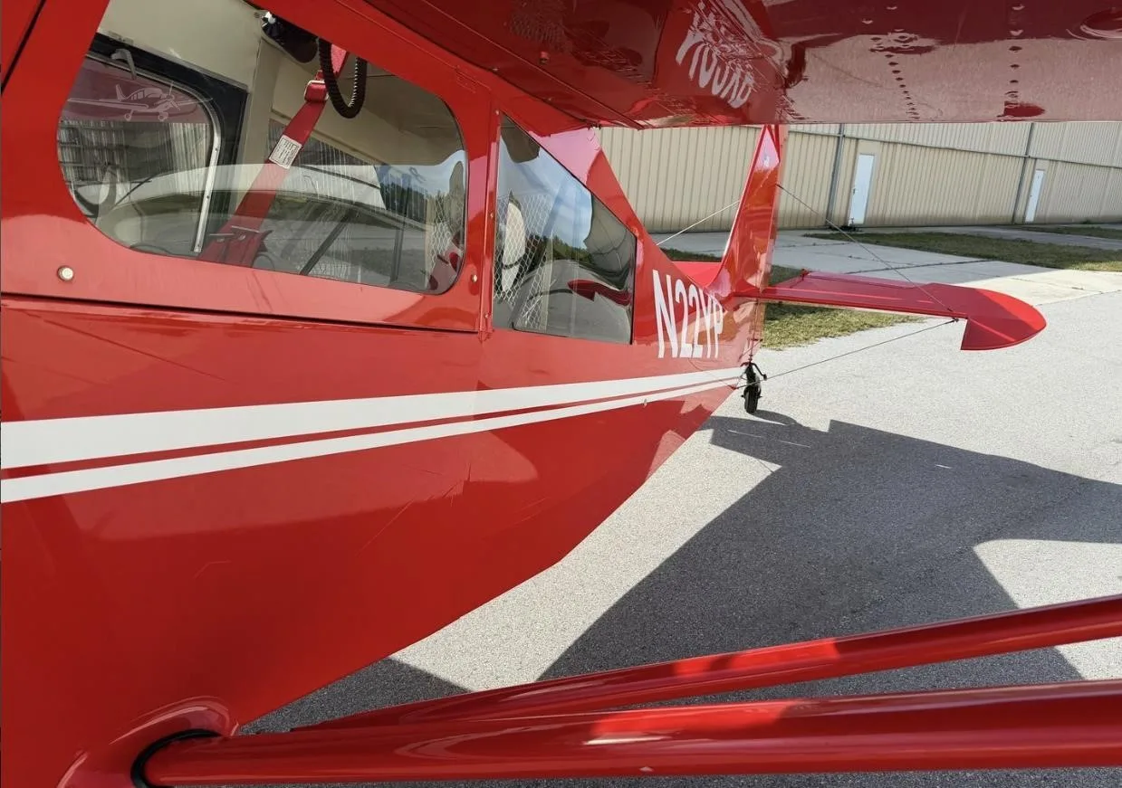 Exterior view of a 2013 AMERICAN CHAMPION 8-KCAB XTREME DECATHLON, N22YP.