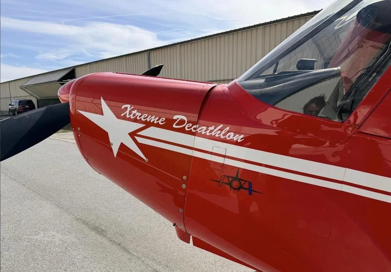Exterior view of a 2013 AMERICAN CHAMPION 8-KCAB XTREME DECATHLON, N22YP.