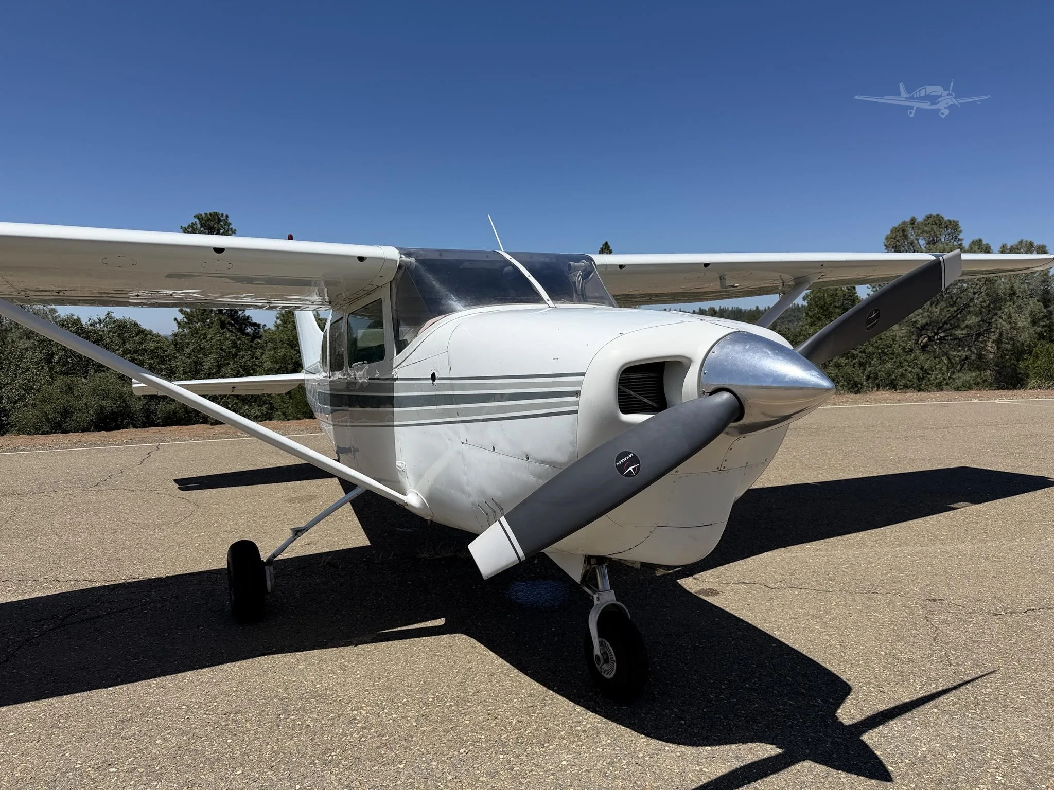 Exterior view of a 1965 CESSNA 210, N4977U.