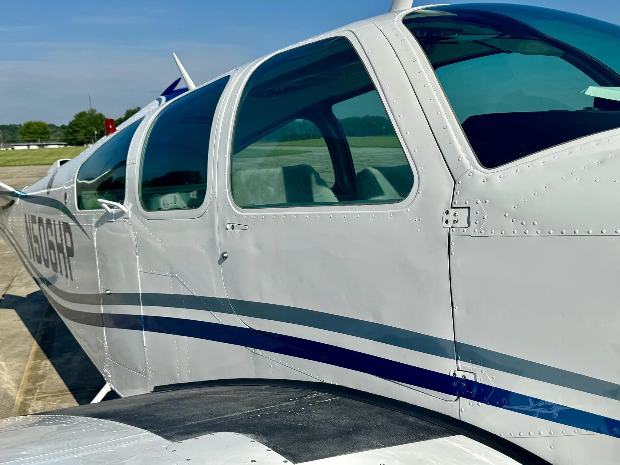 Exterior view of a 1970 BEECHCRAFT V35B BONANZA, N506HP.