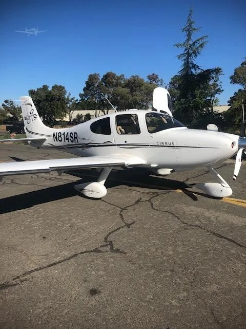 Exterior view of a 2006 CIRRUS SR22-G2, N814SR.