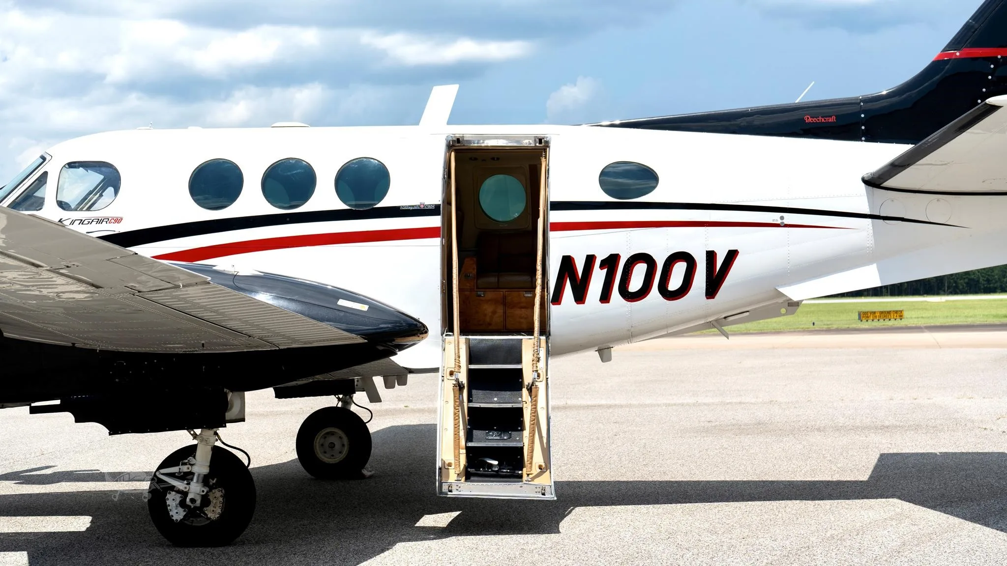 Exterior view of a 1978 BEECHCRAFT KING AIR C90, N100V.