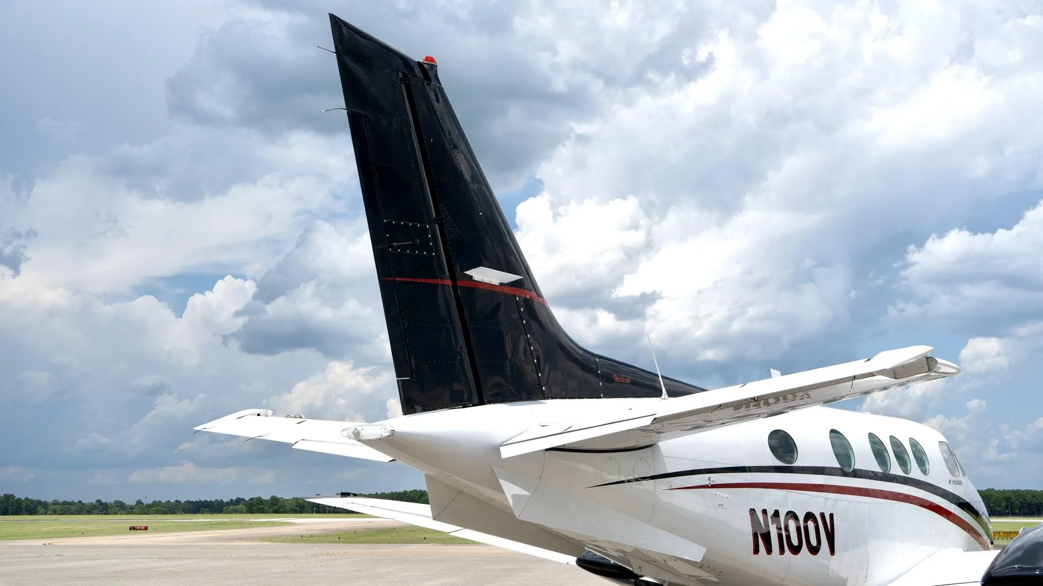 Exterior view of a 1978 BEECHCRAFT KING AIR C90, N100V.