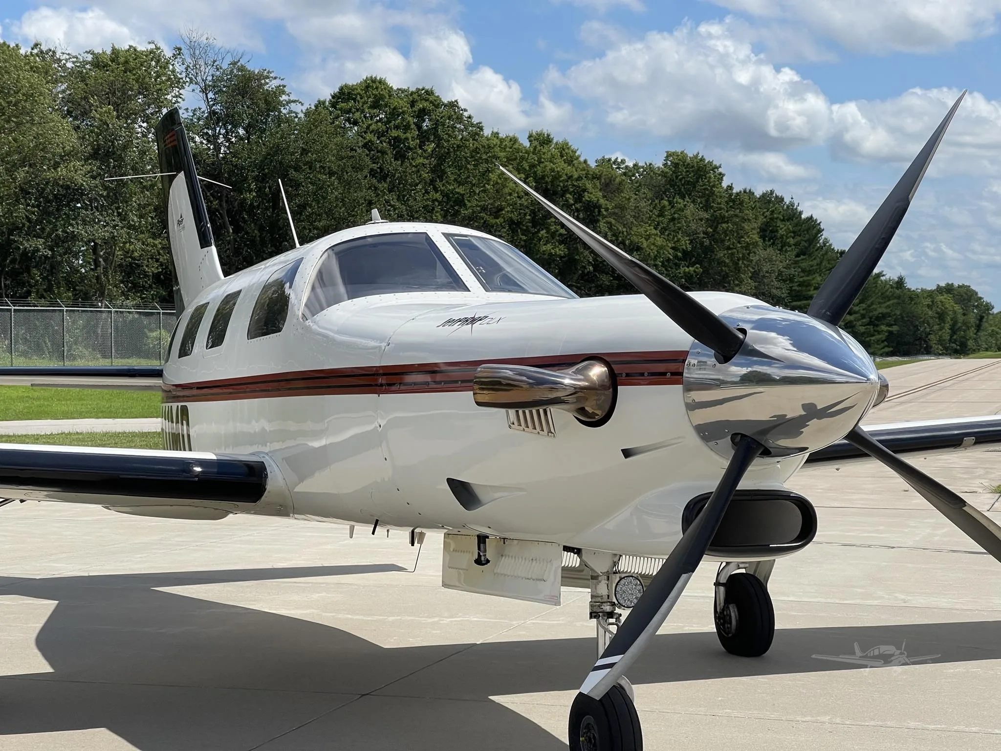 Exterior view of a 2000 PIPER JETPROP, N411MD.