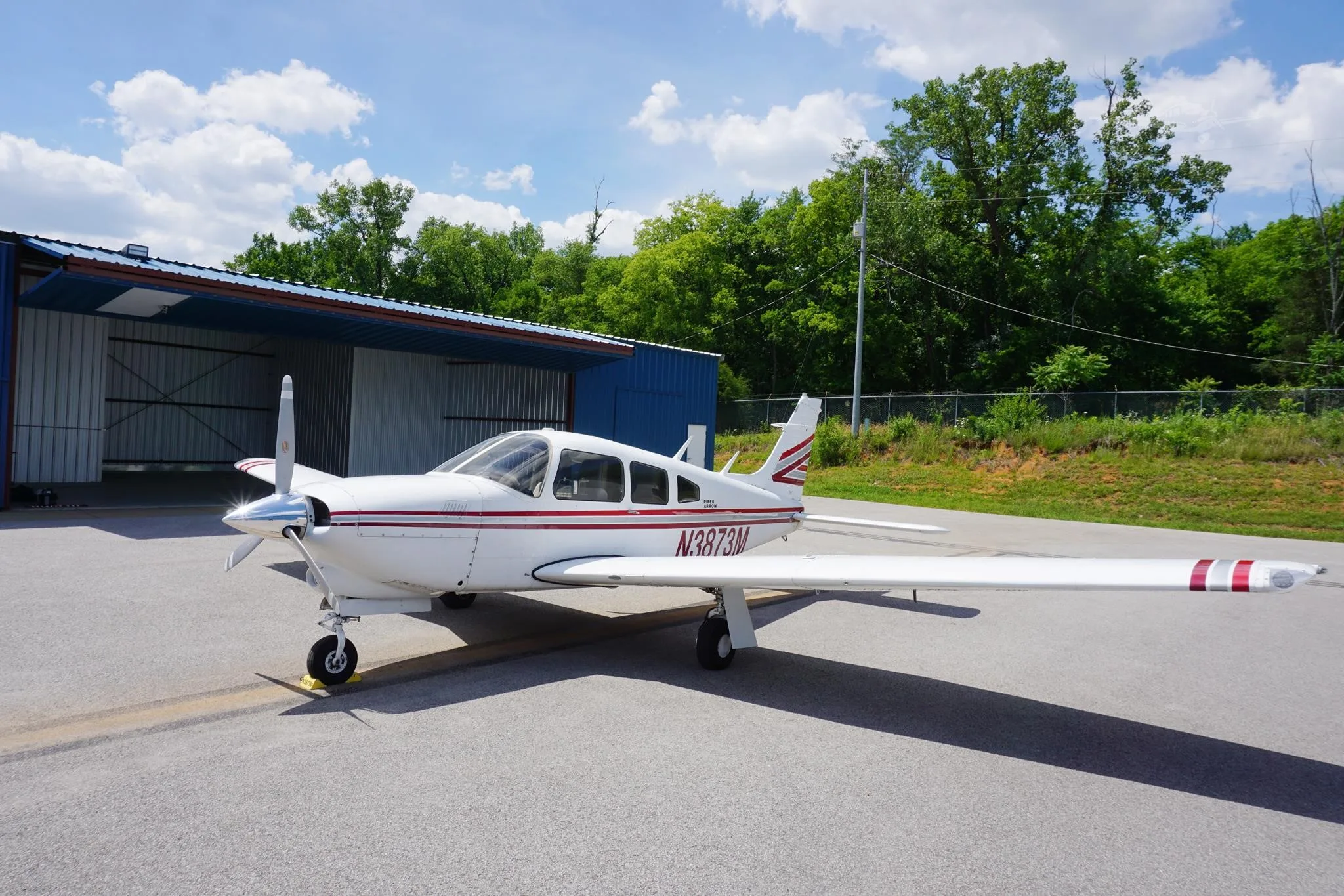 Exterior view of a 1978 PIPER ARROW III, N3873M.