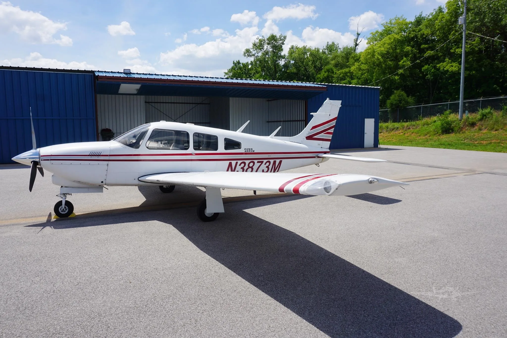 Exterior view of a 1978 PIPER ARROW III, N3873M.
