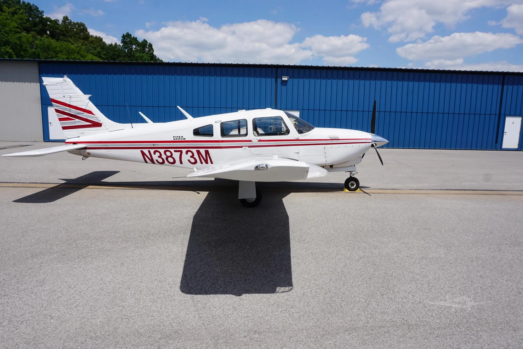 Exterior view of a 1978 PIPER ARROW III, N3873M.