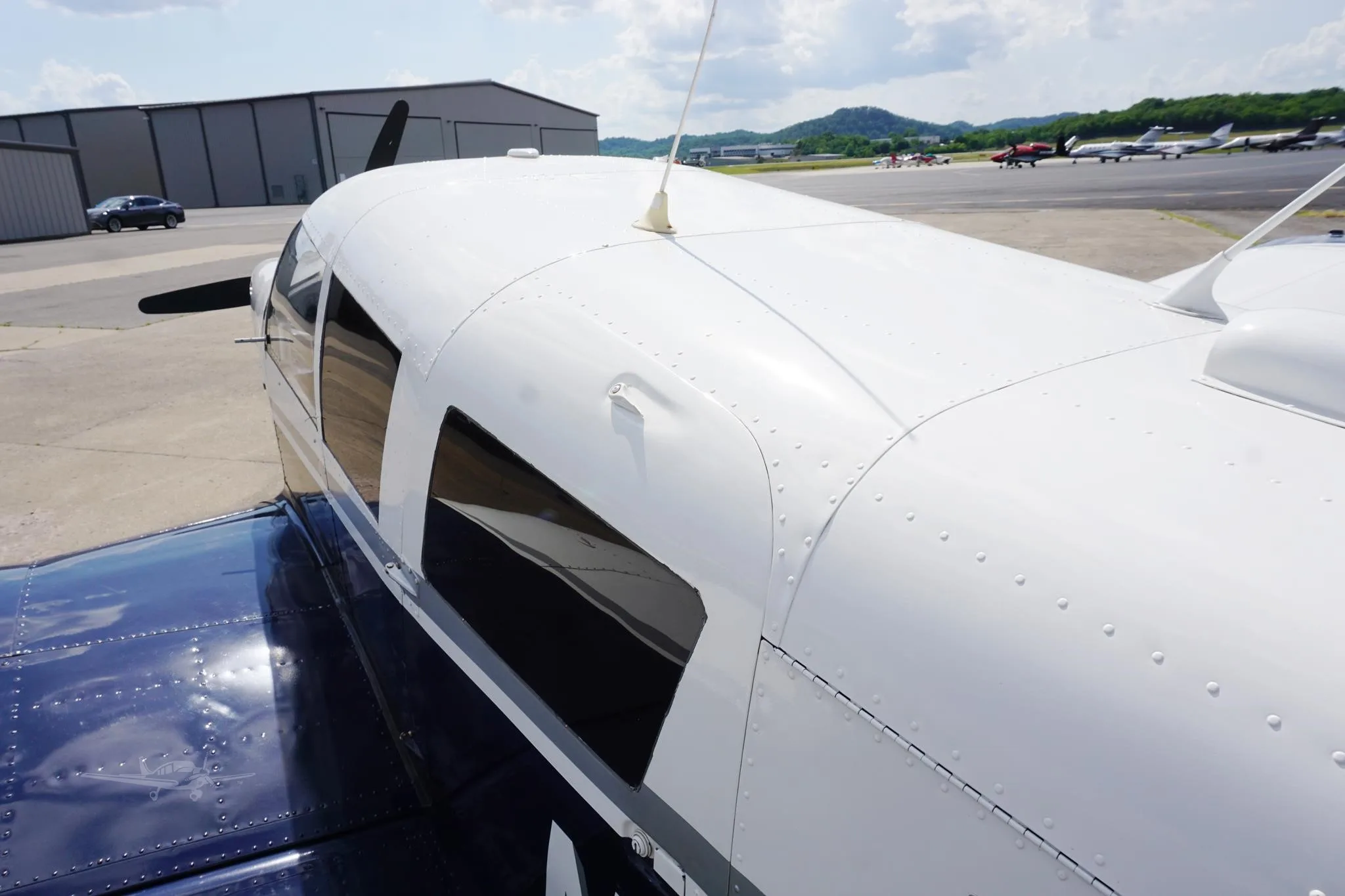 Exterior view of a 1968 PIPER CHEROKEE 6/300, N4143R.