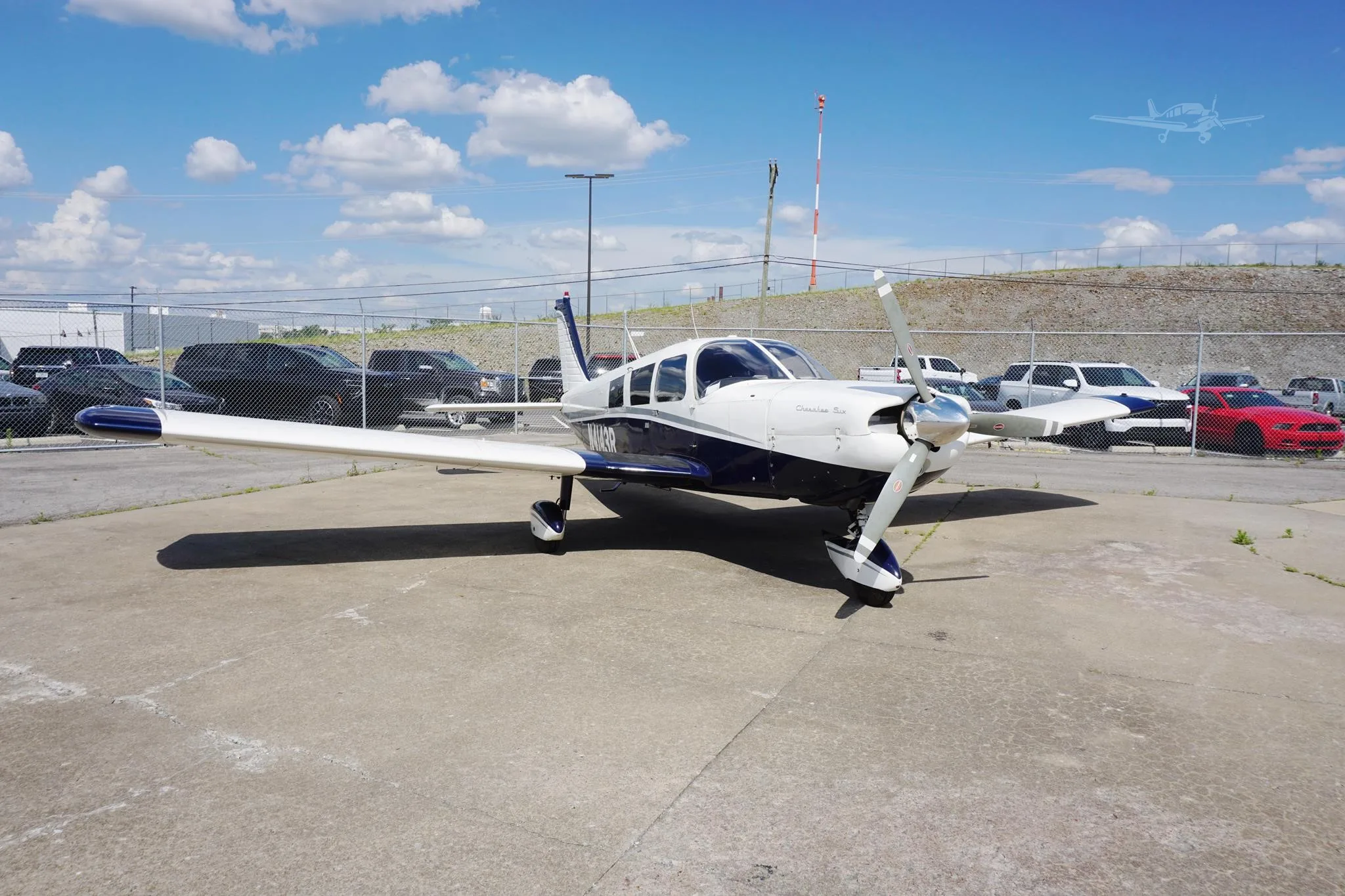 Exterior view of a 1968 PIPER CHEROKEE 6/300, N4143R.