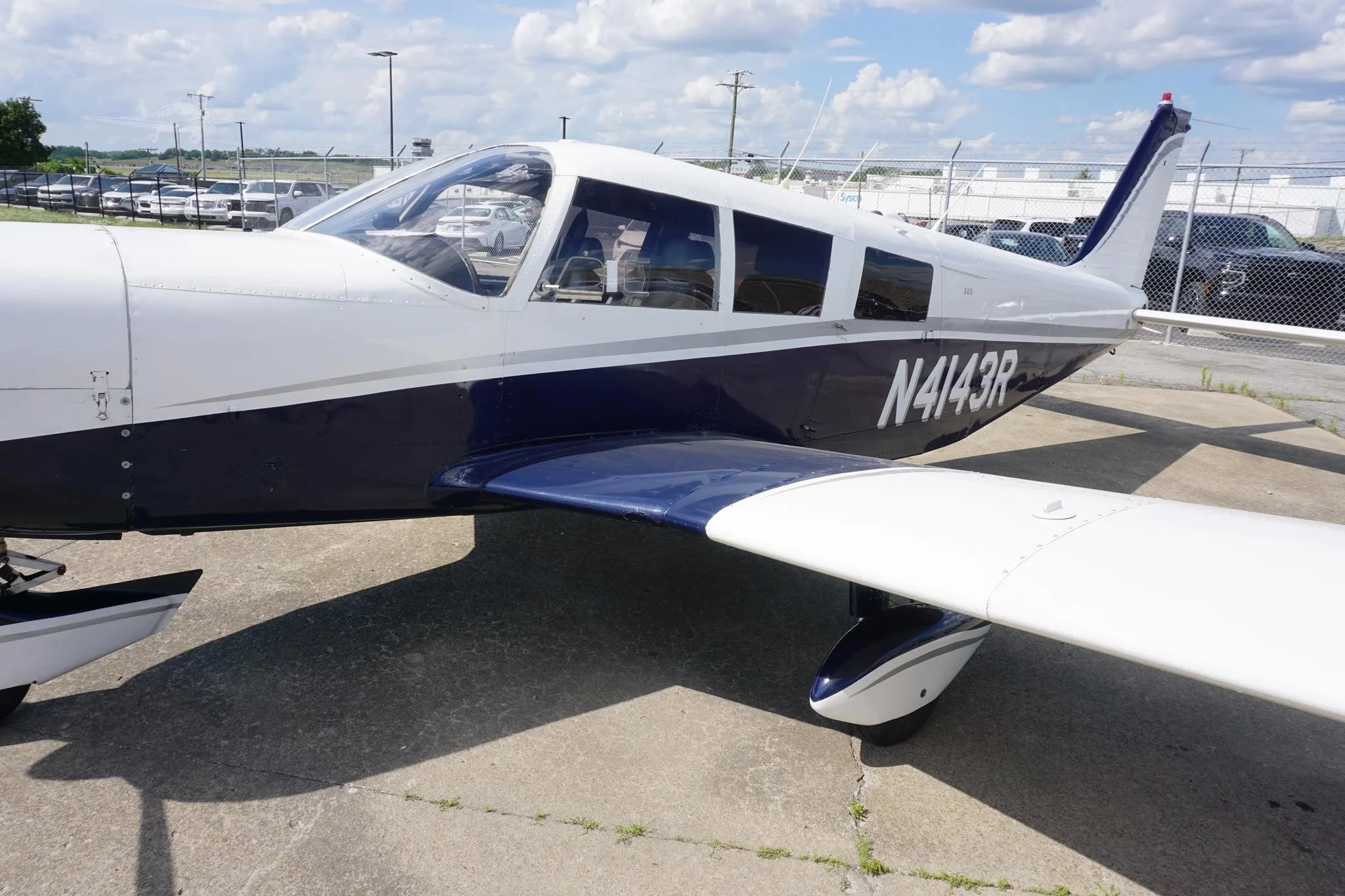 Exterior view of a 1968 PIPER CHEROKEE 6/300, N4143R.
