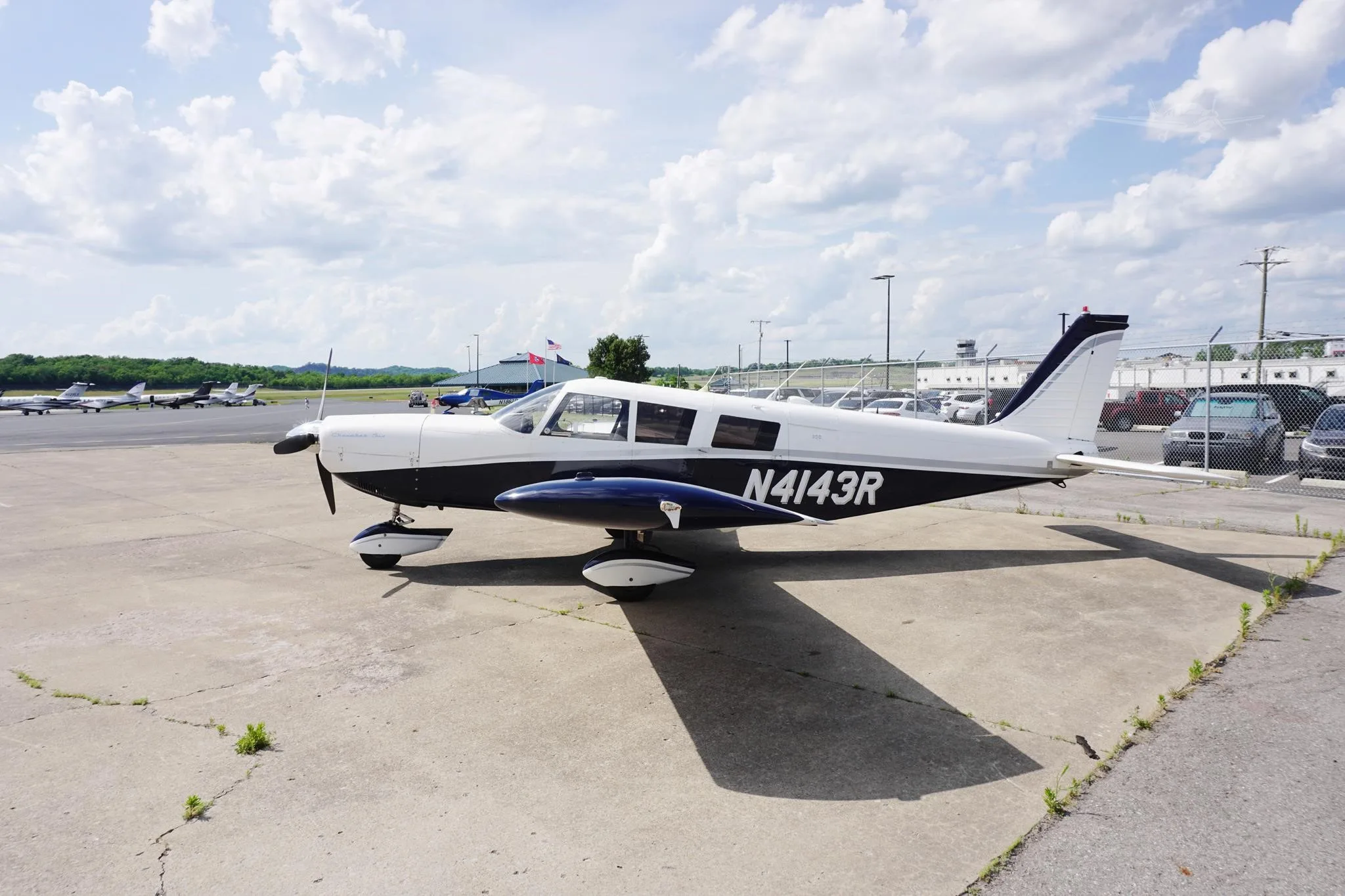 Exterior view of a 1968 PIPER CHEROKEE 6/300, N4143R.