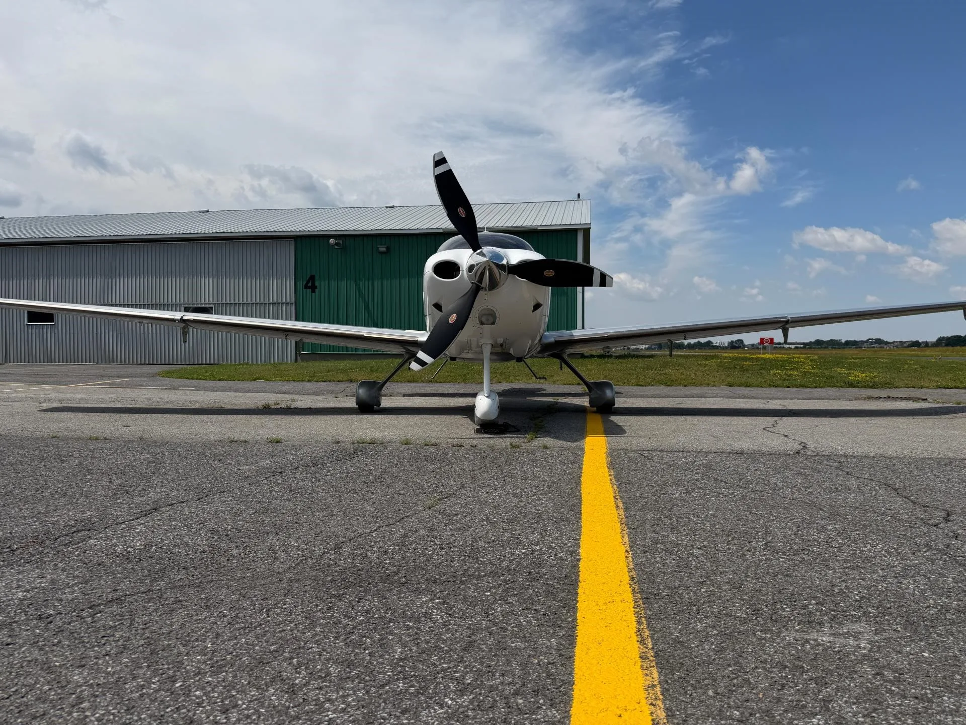 Exterior view of a 2011 CIRRUS SR22-G3 TURBO, C-GDGN.