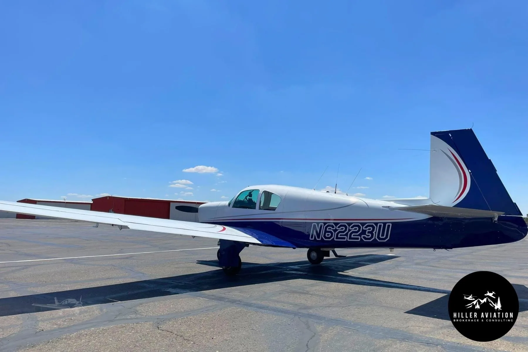 Exterior view of a 1962 MOONEY M20C MARK 21, N6223U.
