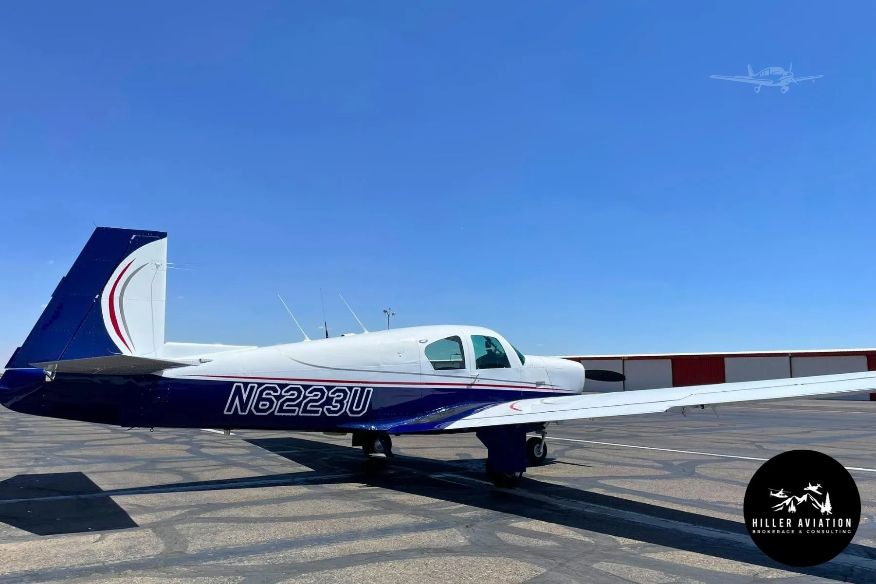 Exterior view of a 1962 MOONEY M20C MARK 21, N6223U.