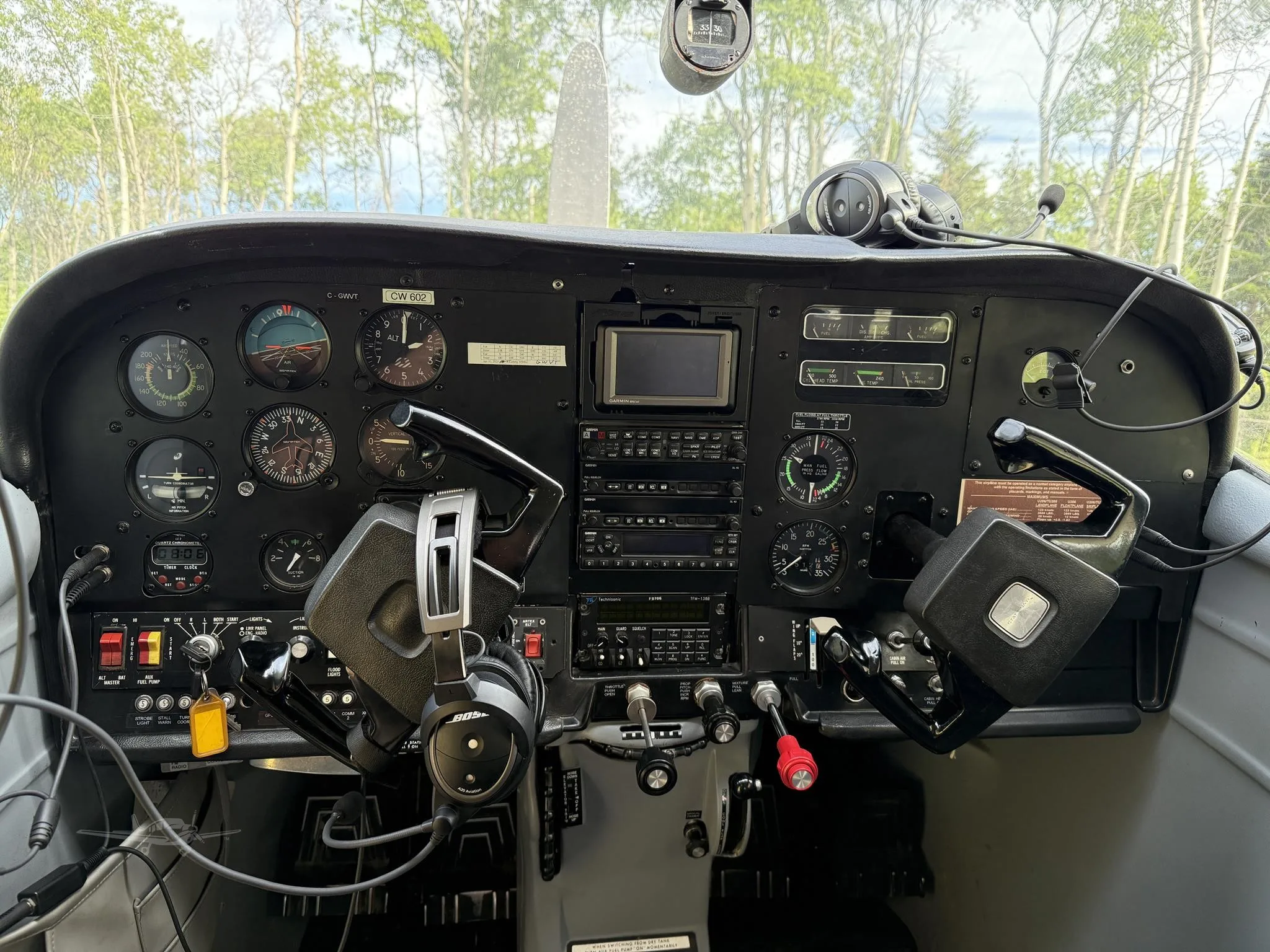 Cockpit and instrument panel of a 1975 CESSNA U206F STATIONAIR.