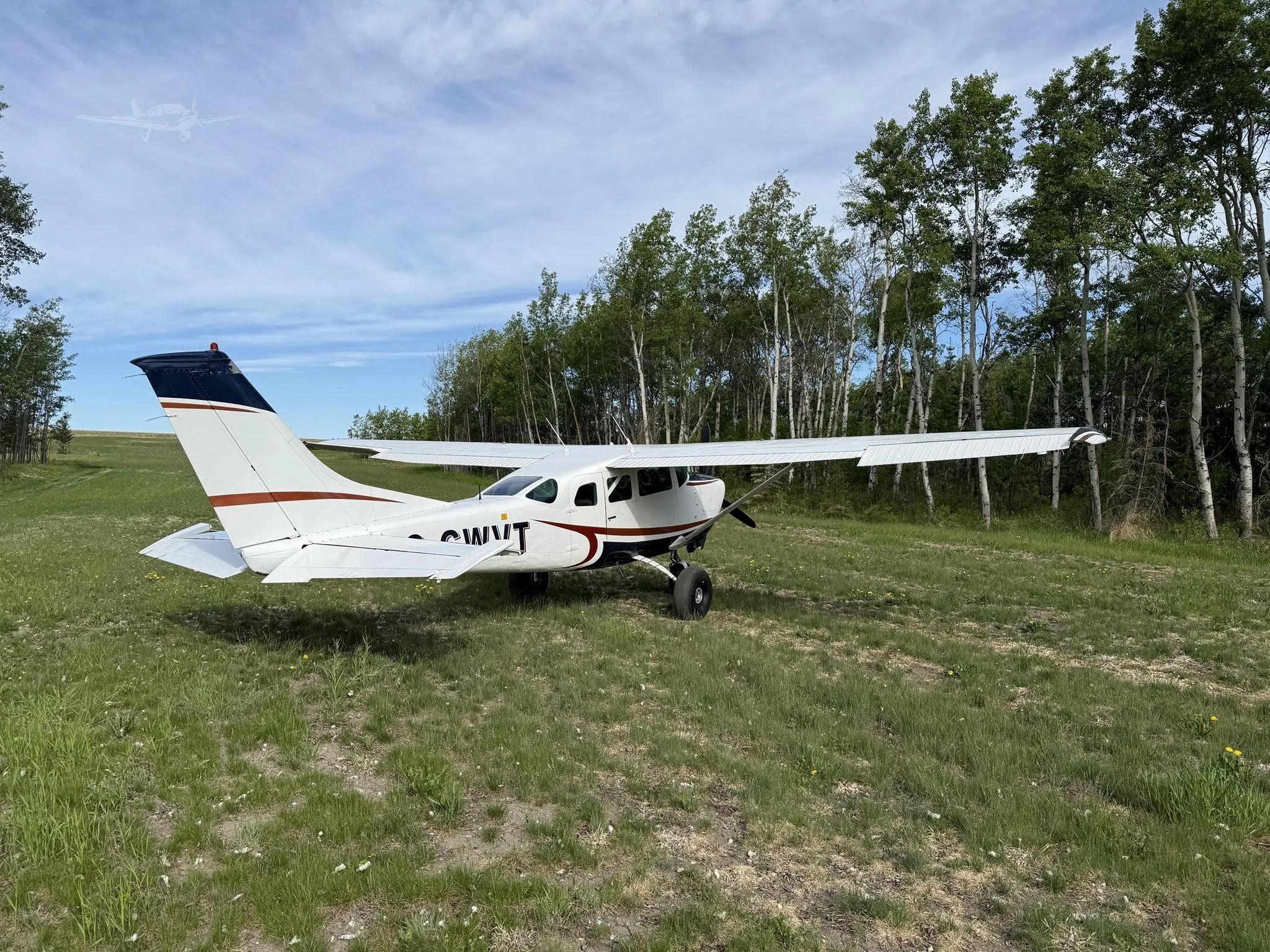 Exterior view of a 1975 CESSNA U206F STATIONAIR, C-GWVT.