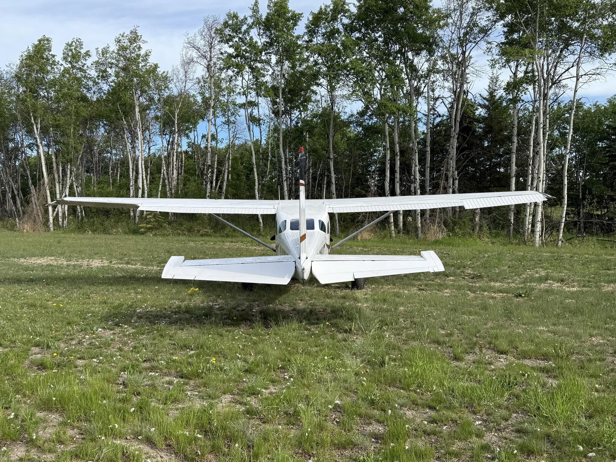 Exterior view of a 1975 CESSNA U206F STATIONAIR, C-GWVT.