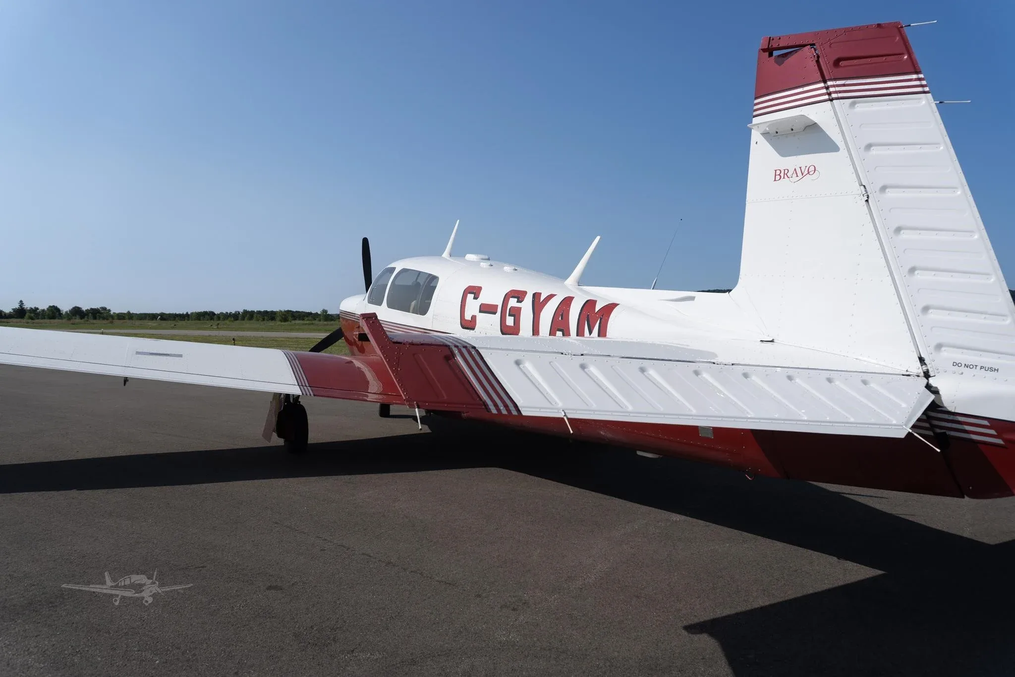 Exterior view of a 2001 MOONEY M20M BRAVO, C-GYAM.