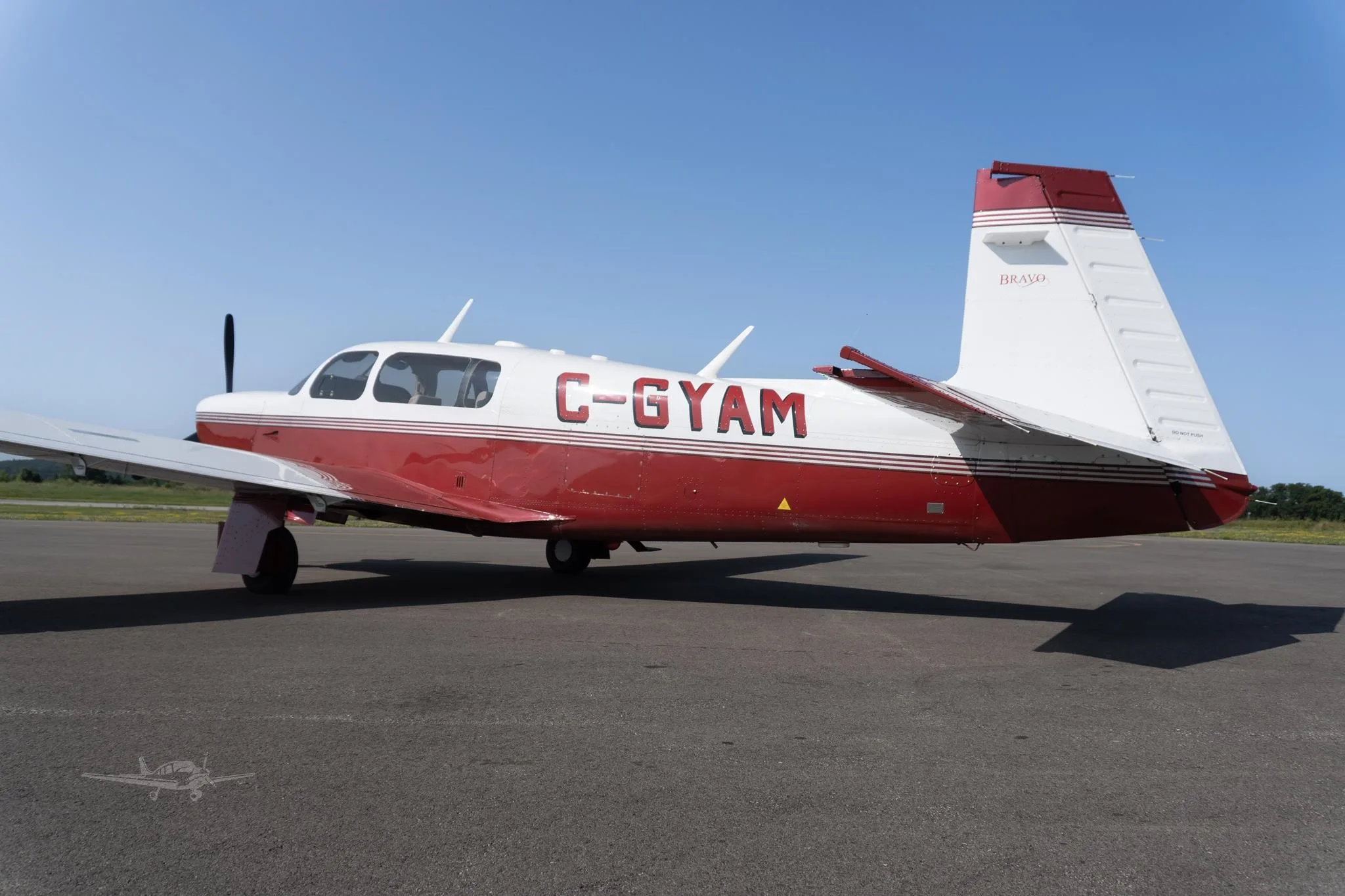Exterior view of a 2001 MOONEY M20M BRAVO, C-GYAM.