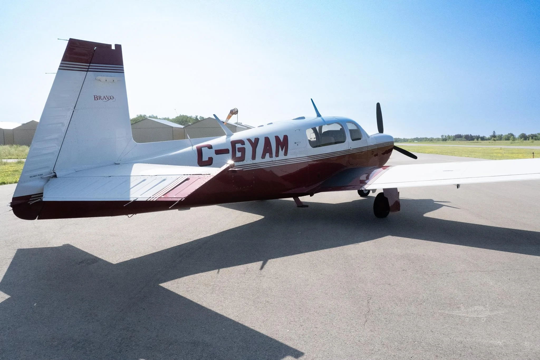 Exterior view of a 2001 MOONEY M20M BRAVO, C-GYAM.