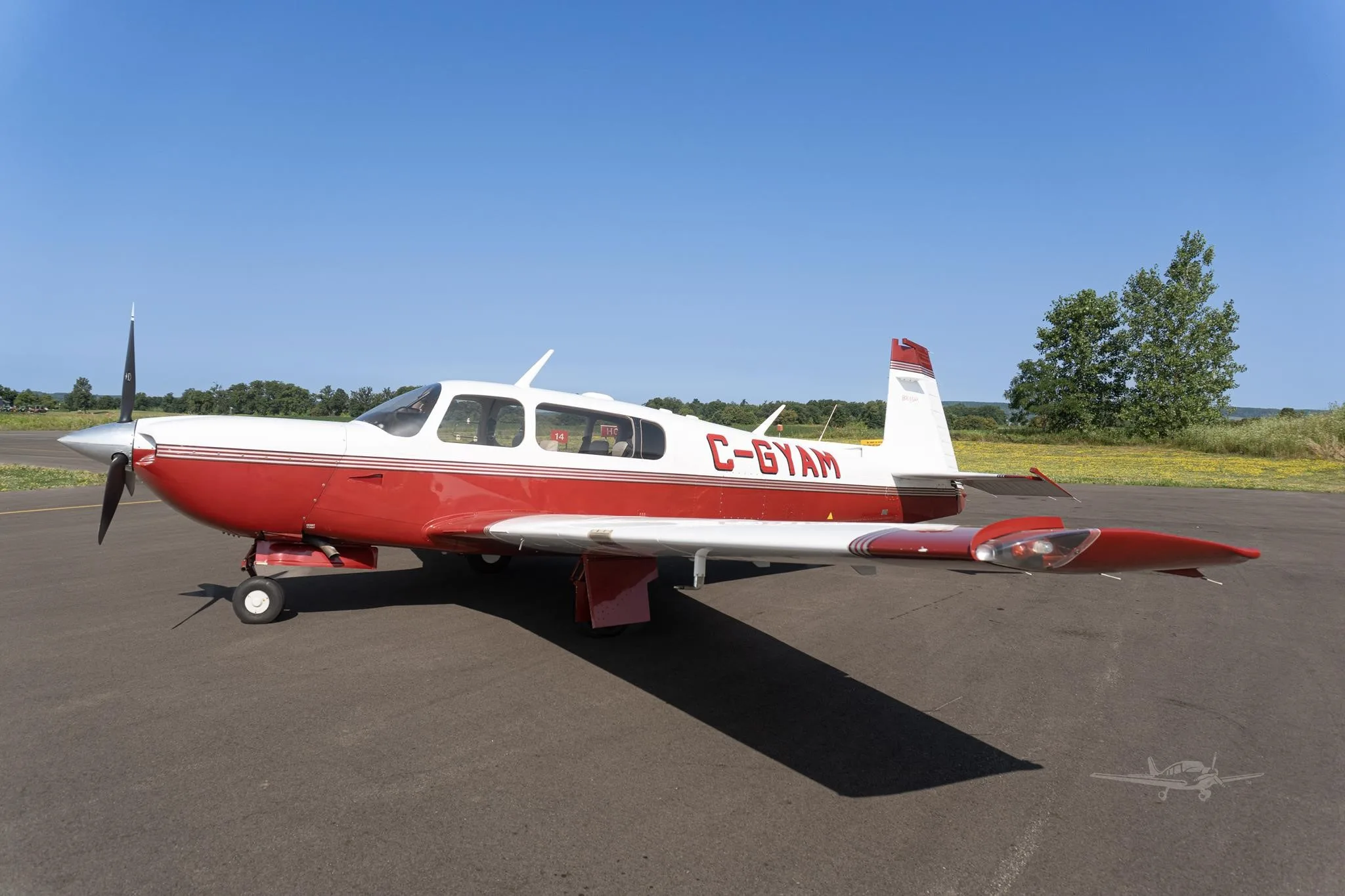 Exterior view of a 2001 MOONEY M20M BRAVO, C-GYAM.