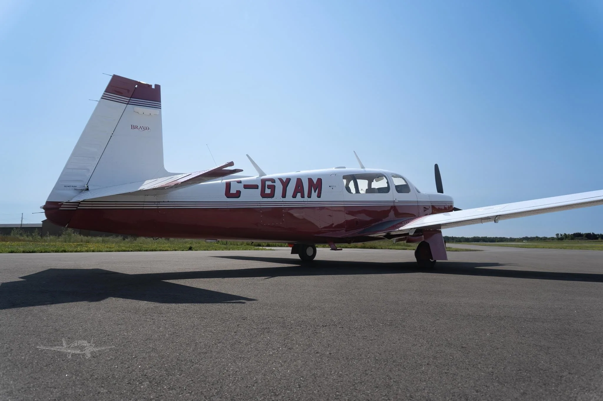 Exterior view of a 2001 MOONEY M20M BRAVO, C-GYAM.