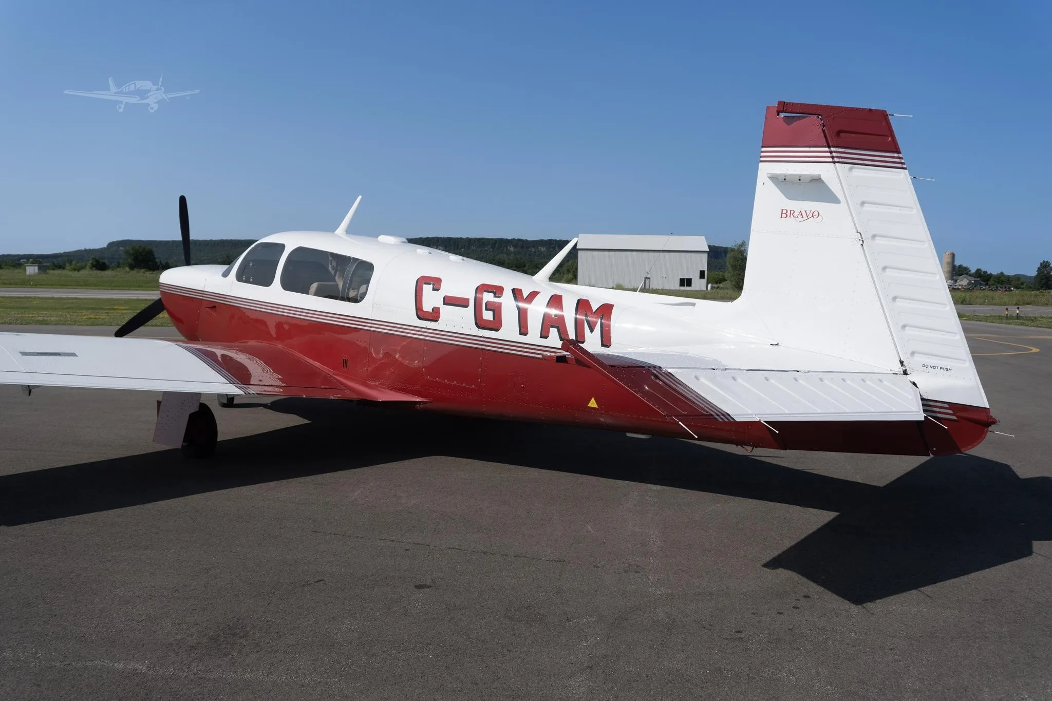Exterior view of a 2001 MOONEY M20M BRAVO, C-GYAM.