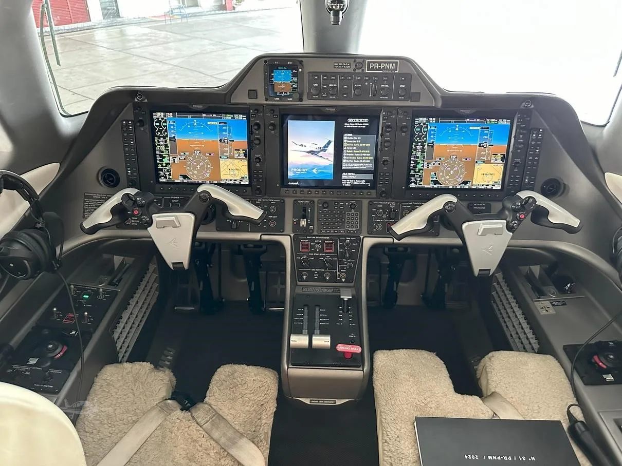 Cockpit and instrument panel of a 2010 EMBRAER PHENOM 100.