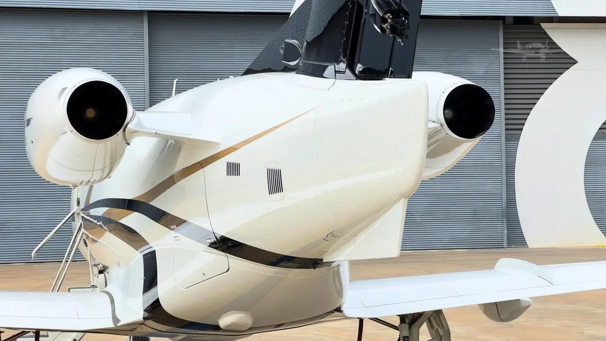 Marketing image of a 2010 EMBRAER PHENOM 100.