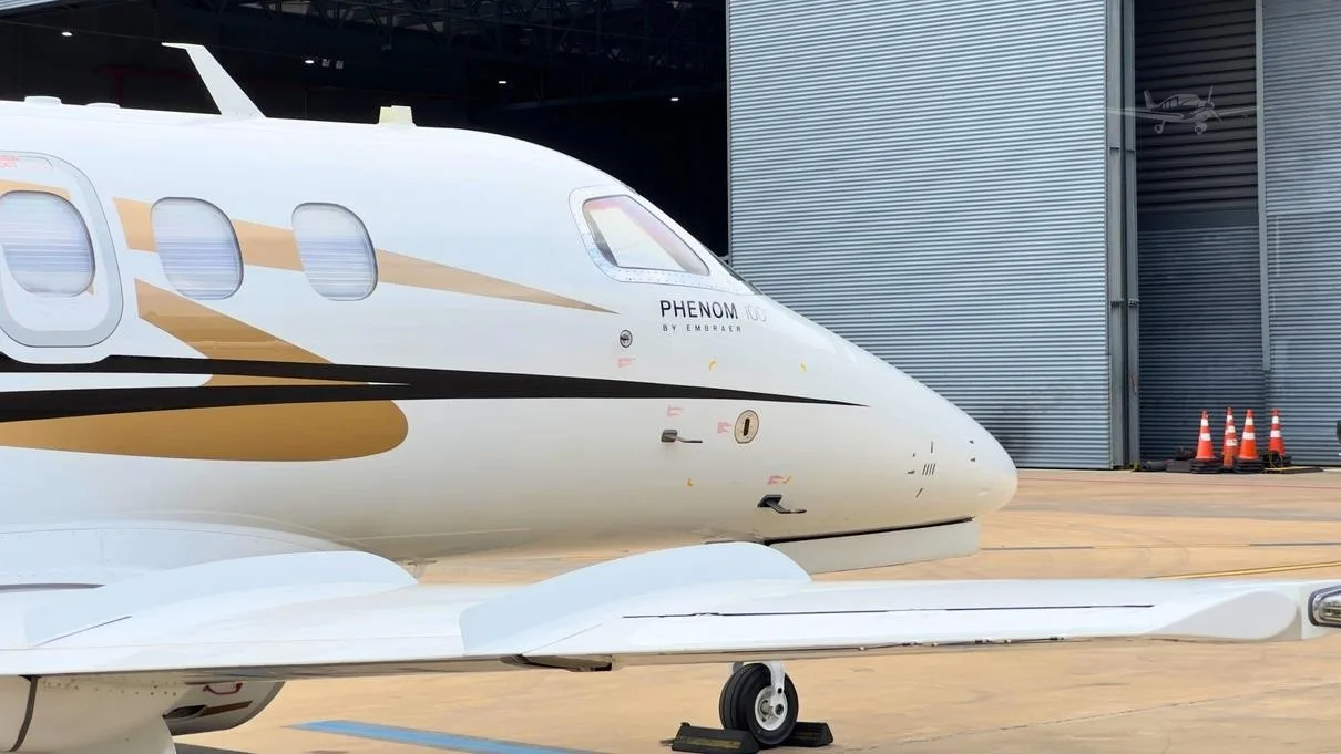 Exterior view of a 2010 EMBRAER PHENOM 100, PR-PNM.