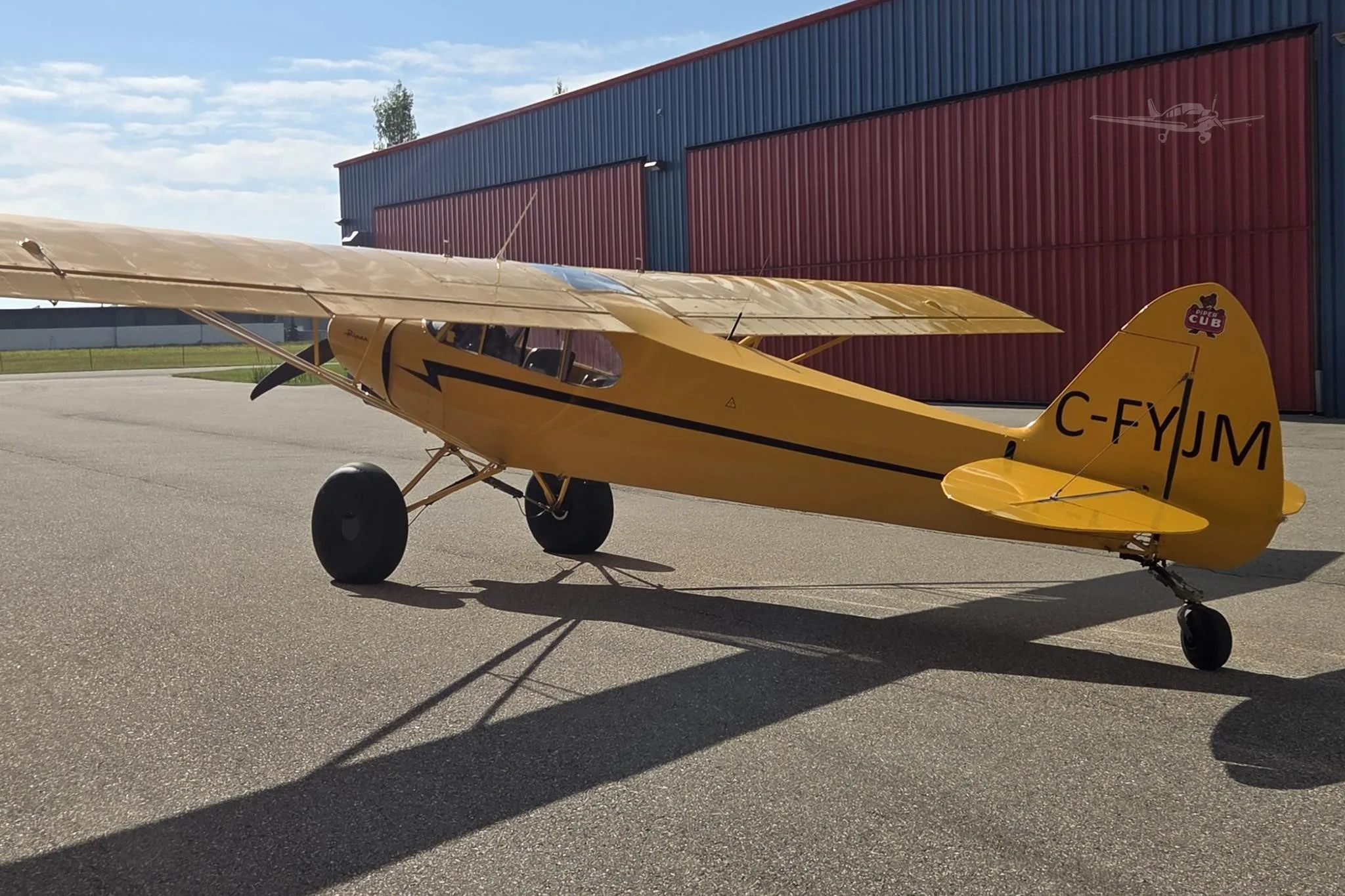 Exterior view of a 1955 PIPER SUPER CUB, C-FYJM.