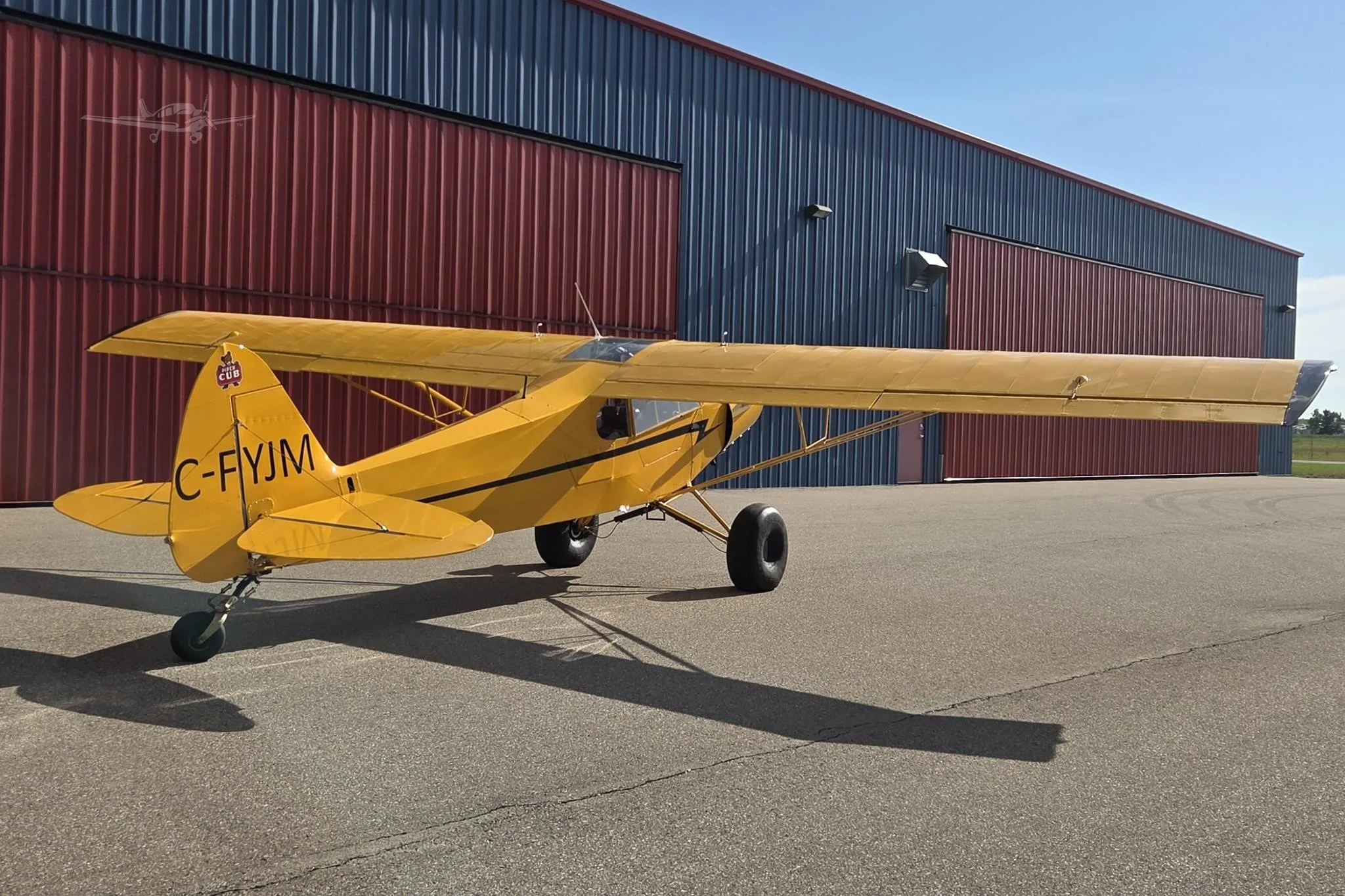 Exterior view of a 1955 PIPER SUPER CUB, C-FYJM.