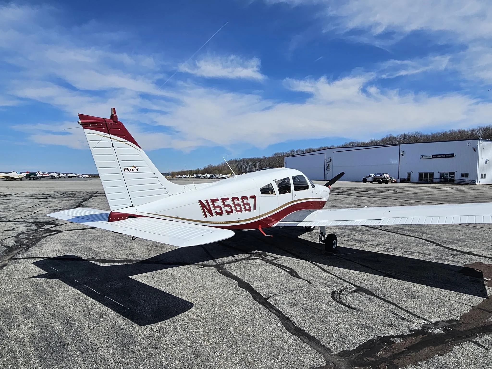Exterior view of a 1973 PIPER ARCHER, N55667.