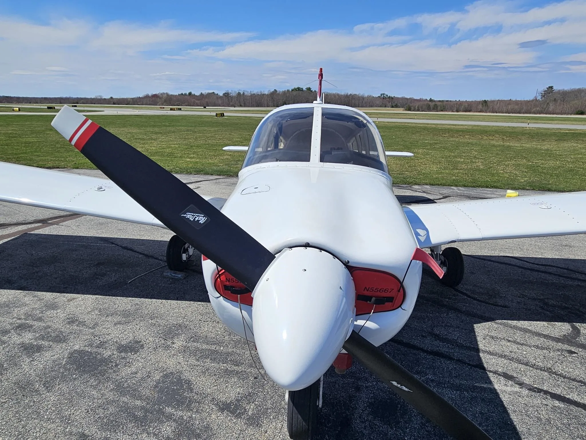 Exterior view of a 1973 PIPER ARCHER, N55667.