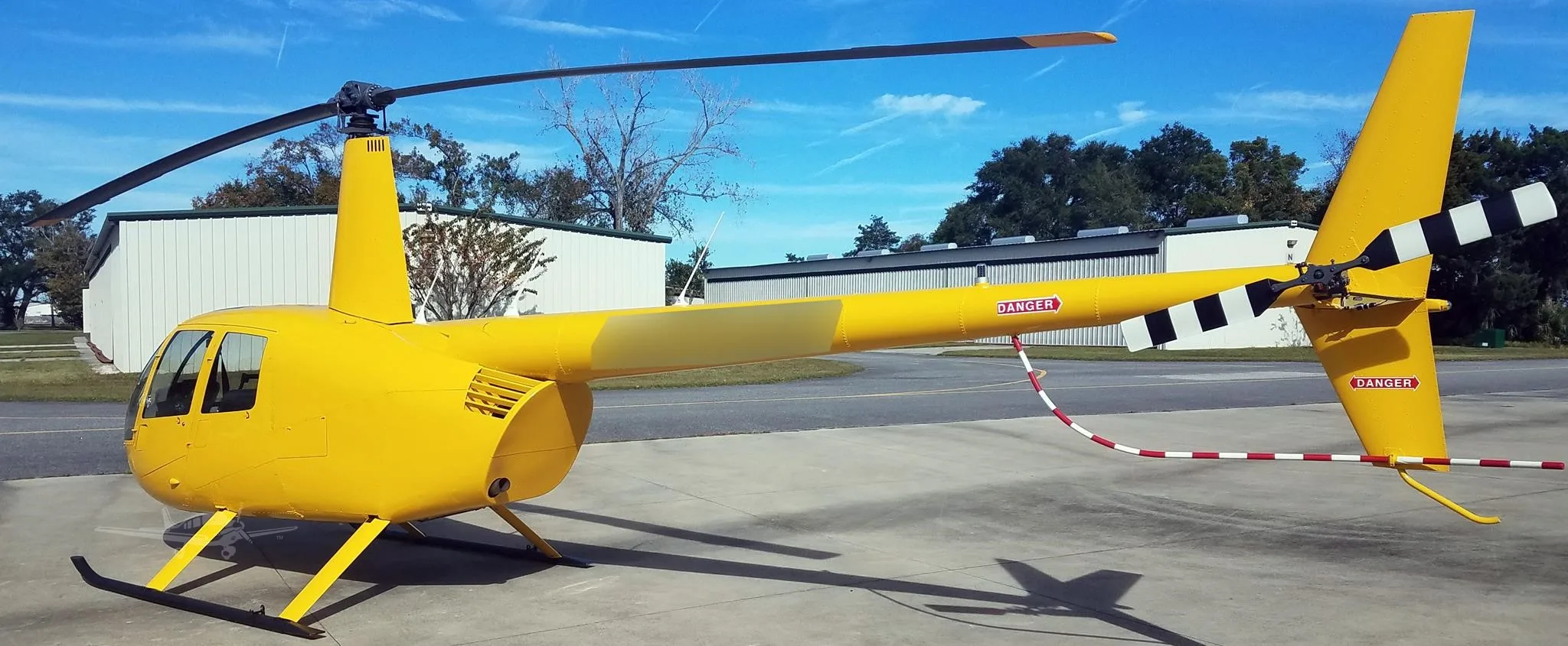 Exterior view of a 2002 ROBINSON R44 RAVEN I.