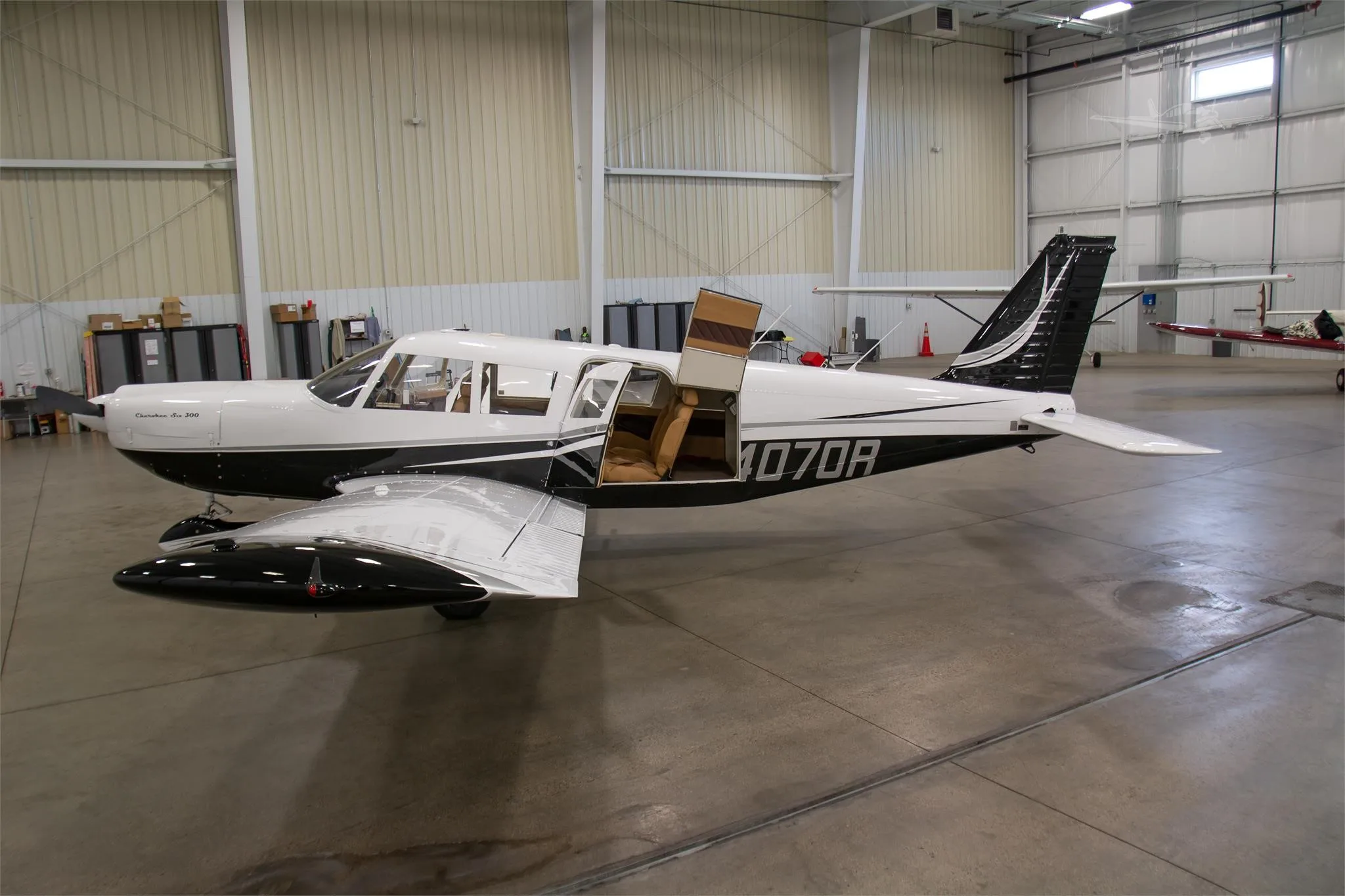 Exterior view of a 1967 PIPER CHEROKEE 6/300, N4070R.