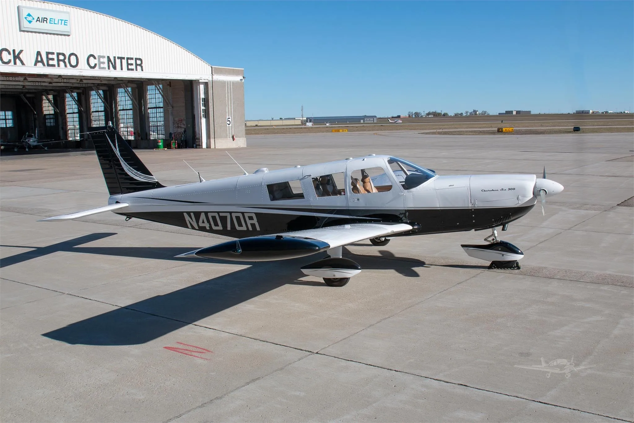 Exterior view of a 1967 PIPER CHEROKEE 6/300, N4070R.