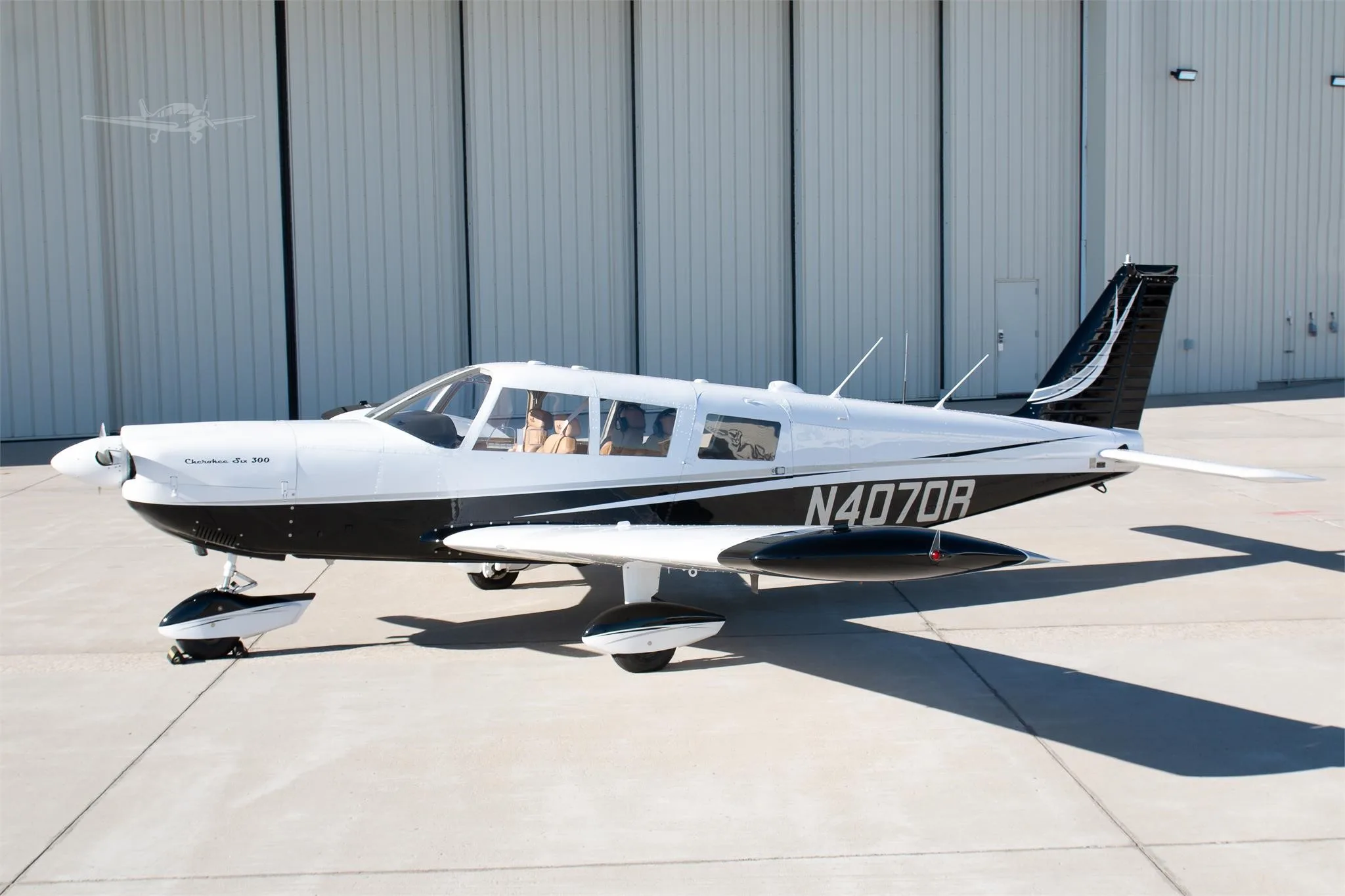 Exterior view of a 1967 PIPER CHEROKEE 6/300, N4070R.