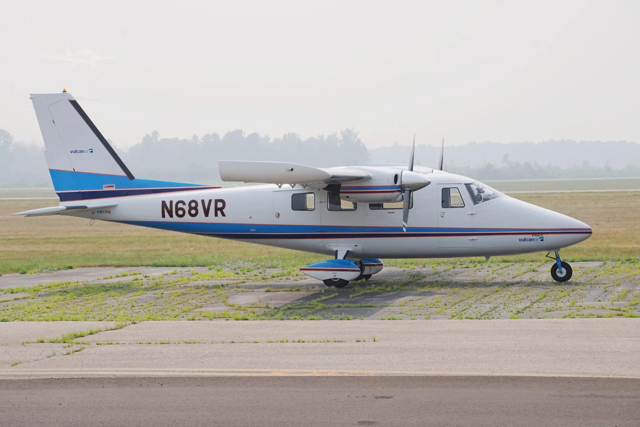 Exterior view of a 2004 VULCANAIR P.68C, N68VR.