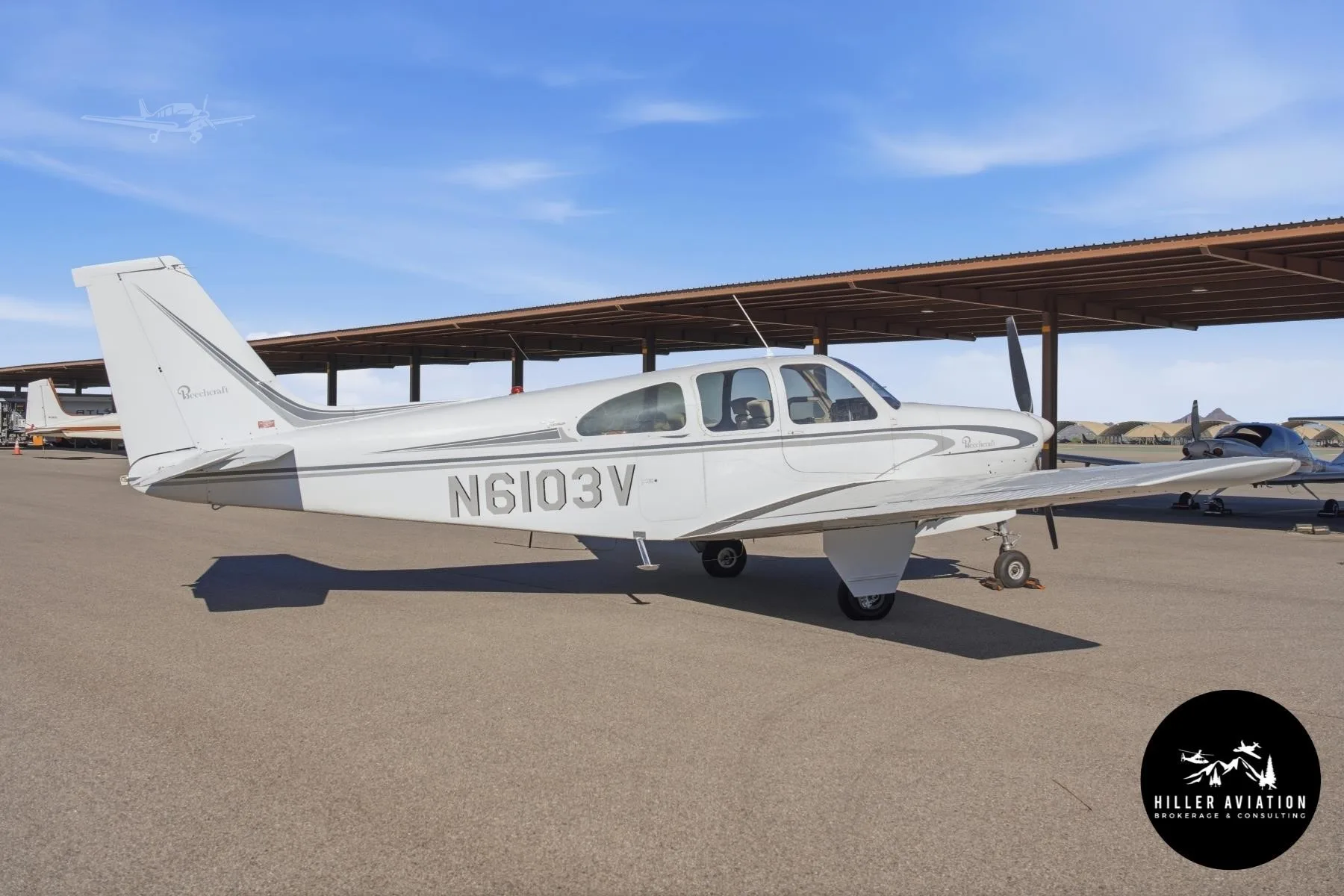 Exterior view of a 1965 BEECHCRAFT C33 DEBONAIR, N6103V.