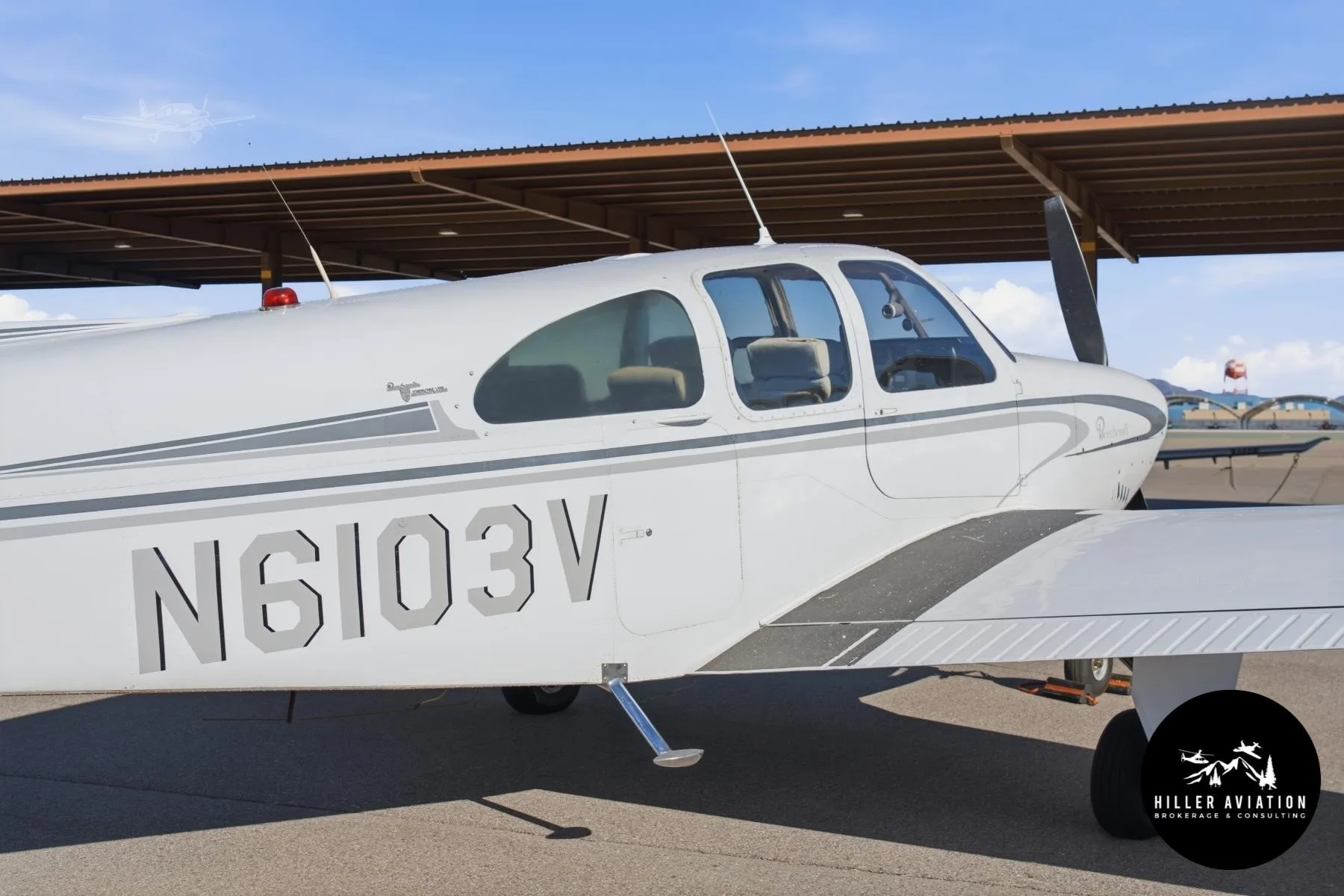 Exterior view of a 1965 BEECHCRAFT C33 DEBONAIR, N6103V.