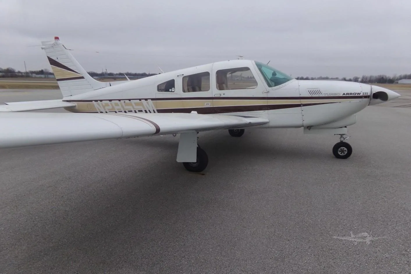 Exterior view of a 1978 PIPER TURBO ARROW III, N2855M.