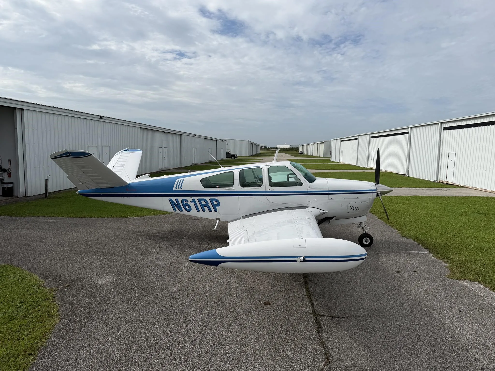 Exterior view of a 1962 BEECHCRAFT P35 BONANZA, N61RP.
